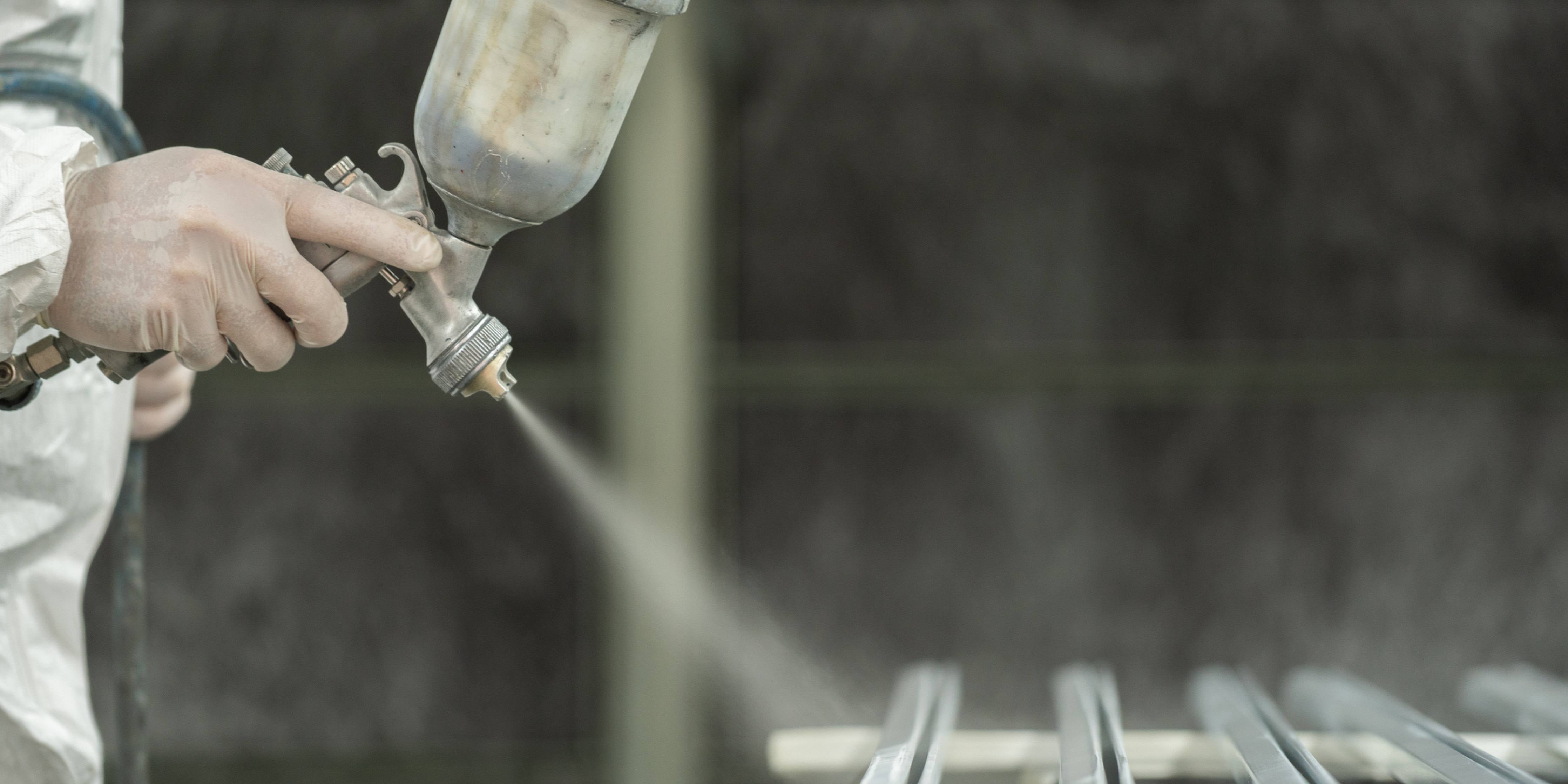 Image of a spray gun being used