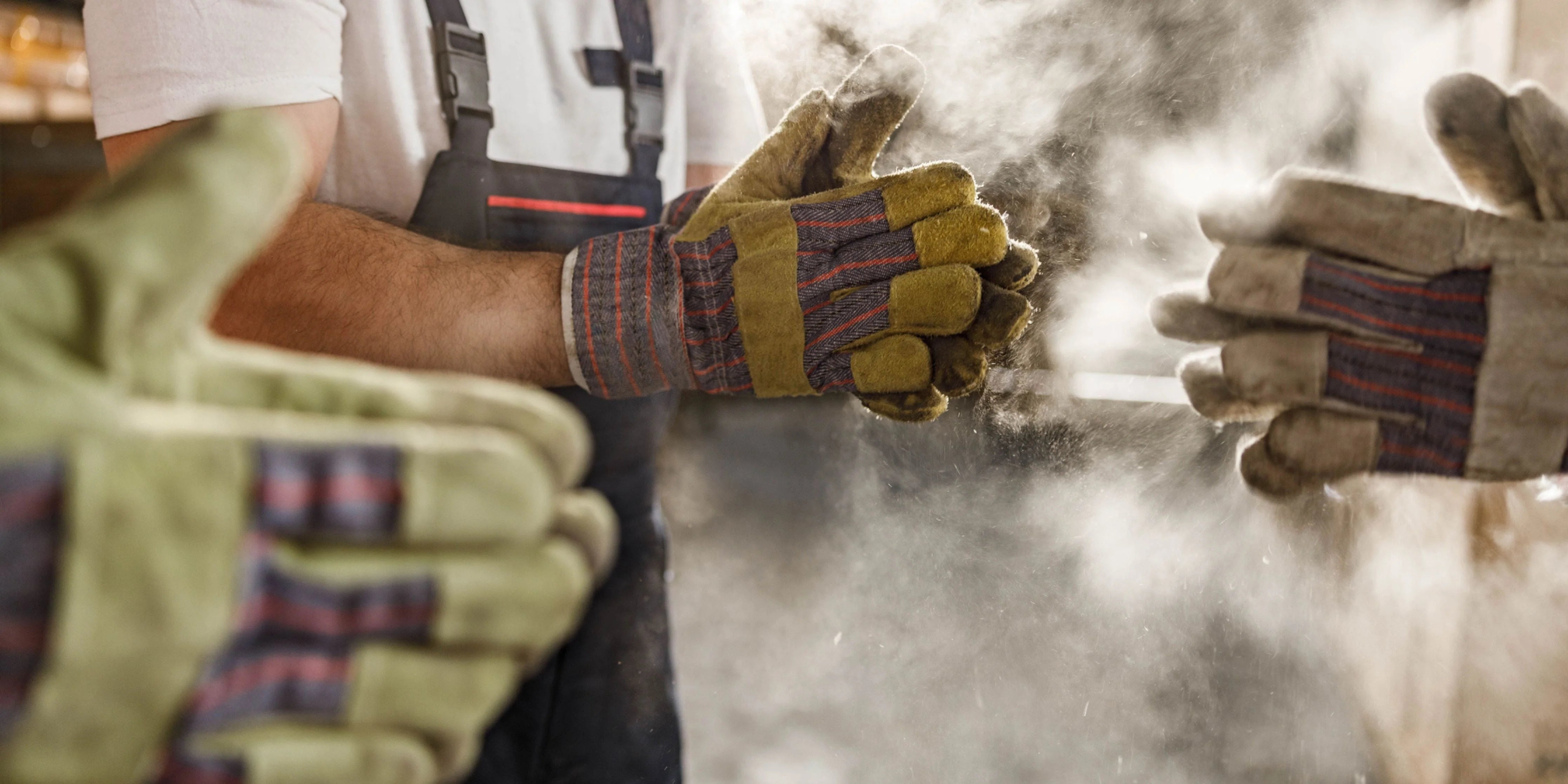 Image of workers wearing gloves to prevent exposure to checmicals