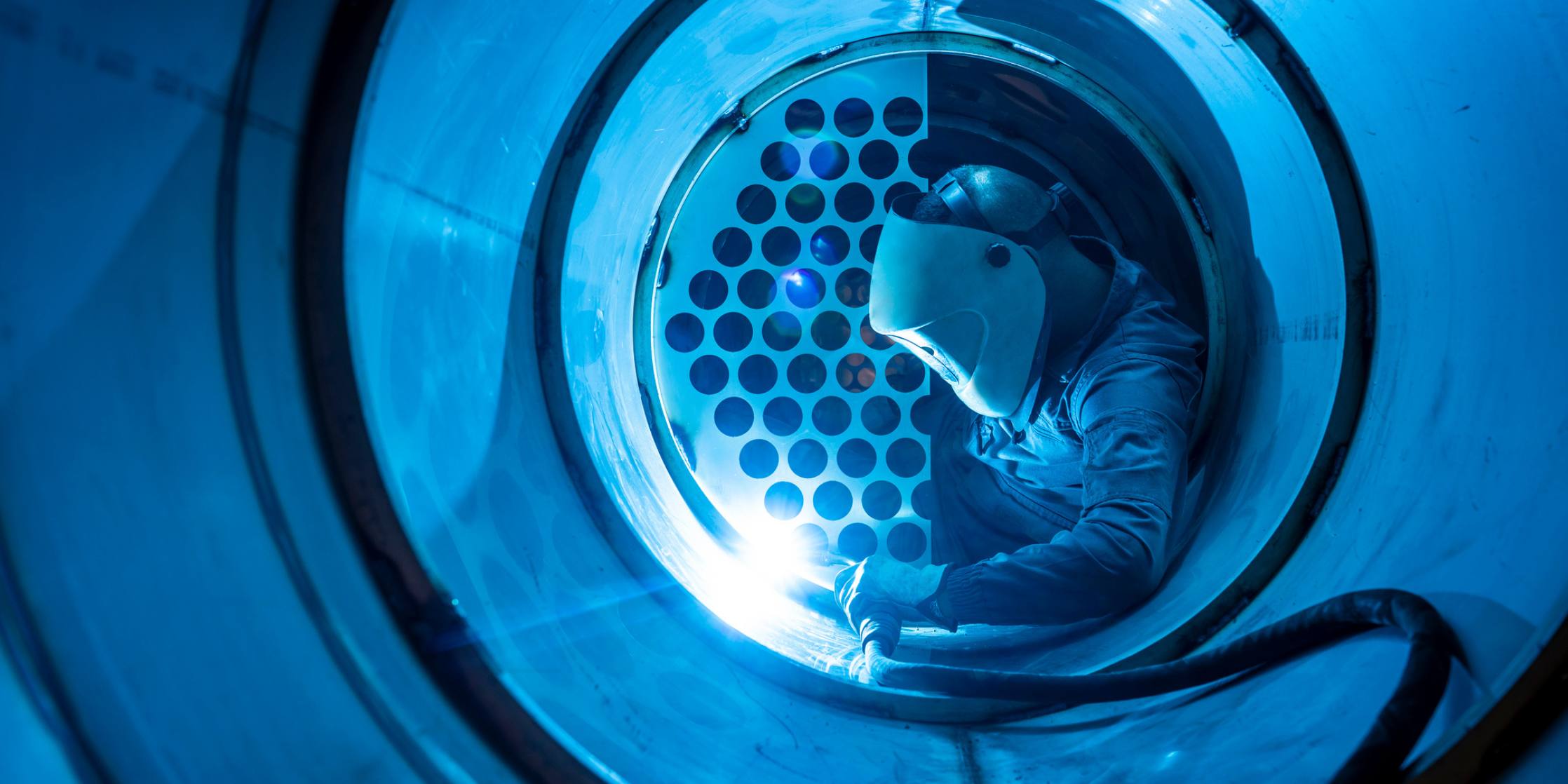 Welder inside a cylindrical structure, welding in a confined space