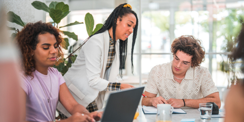 Image of young professionals having a working meeting