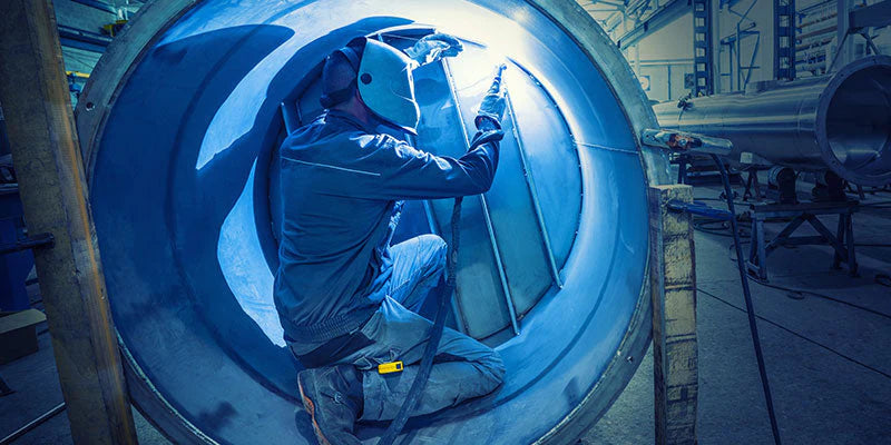 Image of a worker welding 